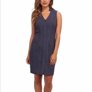 Soft fabric zip-up dress, front pockets. Can be worn zipped or as open vest.